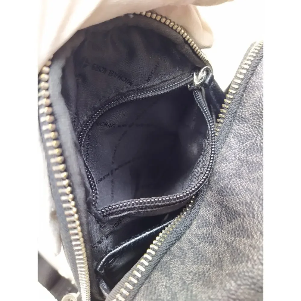 Michael Kors Black Leather MK Printed Zipper Closure Top Handles Backpack